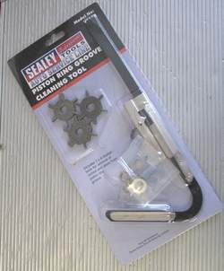 Piston ring groove cleaner
